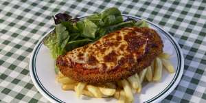Whither the chicken parmigiana? Households have cut their spending on going out for a meal.