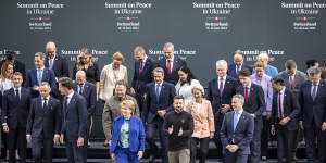 Ukrainian President Volodymyr Zelensky (centre-right) with heads of states after a group picture during the summit on peace in Ukraine in Switzerland.