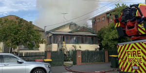 Man rushed to hospital after house fire in Brisbane’s inner north