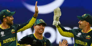 Glenn Maxwell,David Warner and Matthew Wade celebrate Australia’s victory over Namibia