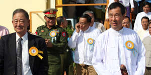 Lo Hsing Han,left,and his son Stephen Law at the opening of the Yangon international airport in 2007.
