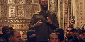 Abu Mohammed al-Jolani speaks at the Umayyad Mosque in Damascus.