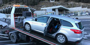 Michelle Cazzulino’s hire car on the tow truck near the entrance to the Mount Blanc Tunnel. She and her two younger children were taken down the mountain in the back of the car.