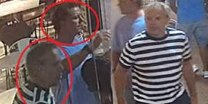 Police released images of Nine CEO Matt Stanton (striped shirt) and an unidentified man (blue shirt) who helped save a teenager from a massive brawl in Manly on 6 January.