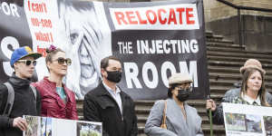 Residents against the location of the safe injecting room protest on the steps of parliament on Thursday.