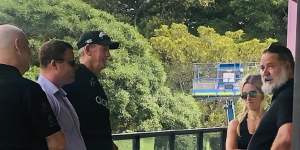 Russell Crowe catches up with Wayne Bennett and Souths officials on Monday.