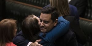 Independent MP Alex Greenwich is congratulated by Liberal MP Felicity Wilson after the passing of the bill to decriminalise abortion.