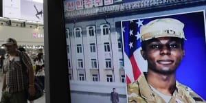A TV screen shows a file image of American soldier Travis King during a news program at the Seoul Railway Station in Seoul,South Korea,on Wednesday.