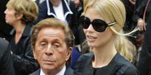 Italian designer Christian Valentino (L) and German model Claudia Schiffer attend the funeral service for late fashion designer Yves Saint Laurent in Paris June 5,2008. 