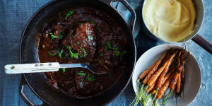 Braised beef cheeks with carrots and parsnip puree.