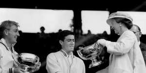 The Duchess of Kent presents trophies to Australians Lew Hoad (left) and Ken Rosewall,after their Men’s doubles victory at Wimbledon,July 8,1956.