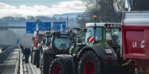 French farmers block access to a highway in Bayonne,south-western France. 