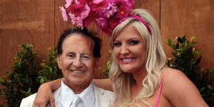 Geoffrey Edelsten with his then wife Brynne on Melbourne Cup Day.