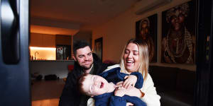 Kara Napper wth her husband,Dave,and son,Cgarlie,2 at home in Kirrawee.