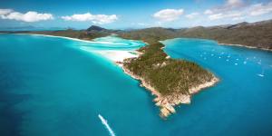 Hamilton Island is larger and has more infrastructure facilities than other Queensland islands.
