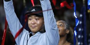 Extraordinary:Naomi Osaka had to fight back tears during a trophy presentation filled with emotion and some boos.
