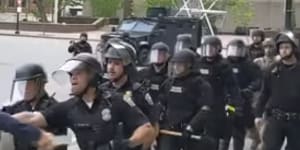 Fifty-seven police officers resign after suspension of officers who shoved man,75,during Floyd protest