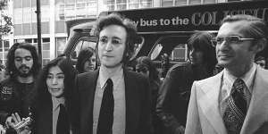 Yoko Ono,former Beatle John Lennon and attorney Leon Wildes leave the Immigration and Naturalisation Service in New York,1972.
