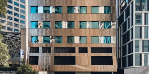 Bronze cladding lifts ‘tired’ Flinders Lane office