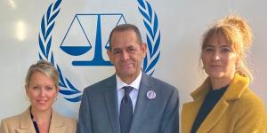 Robinson with Anton Abu Akleh,brother of Al Jazeera journalist Shireen Abu Akleh,and colleague Tatyana Eatwell at the ICC.