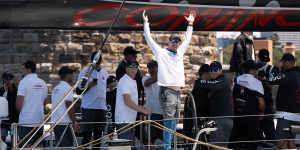 Skipper John Winning and crew of maxi yacht Comanche celebrate Tuesday’s Big Boat Challenge win.