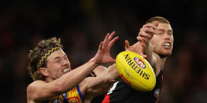 West Coast’s Jayden Hunt and Bomber Peter Wright contest the ball.