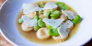 Coin-shaped anolini pasta with broad beans,parmesan and pecorino.