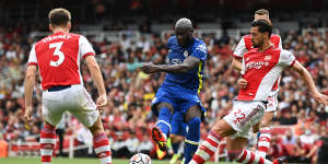 Romelu Lukaku of Chelsea shoots while under pressure from Pablo Mari of Arsenal.