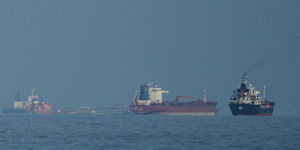 This March photograph shows oil tankers and cargo ships lining up in the Strait of Hormuz