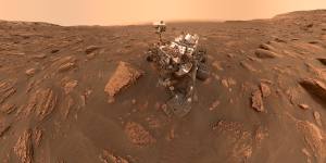 NASA rover Curiosity takes a selfie via a camera on the end of its robotic arm at Gale Crater on Mars. This panorama is made up of 57 individual images stitched together.