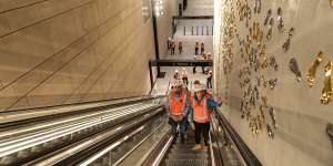 Transport Minister Jo Haylen,right,tours the new Waterloo metro station. 