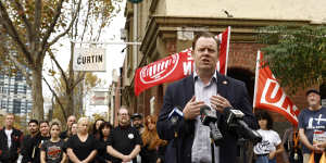 Unionists and local residents gather at Carlton’s John Curtin Hotel to back the “green ban” on the redevelopment of the site. 