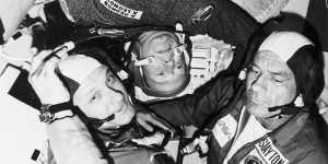 Stafford,Leonov and US astronaut Donald Slayton inside the Apollo-Soyuz spacecraft during the Russian-American “handshake in space”.