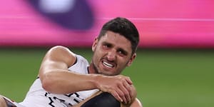 Marc Pittonet went down with a knee injury in the first quarter against Fremantle.