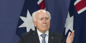 Former prime minister John Howard pays tribute to Bob Hawke at a press conference in Sydney.