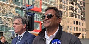 Former AFL player Nicky Winmar outside court.
