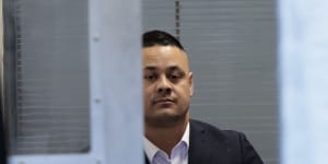 Jarryd Hayne is taken into custody after his bail was revoked on Friday. 
