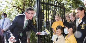 NSW Premier Dominic Perrottet with student Ethan Ooi at Randwick Public School.