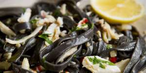 Squid ink fettuccine with crab and chilli.