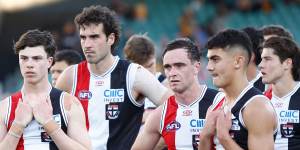 Dejected St Kilda players after their loss to Hawthorn.