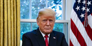 U.S. President Donald Trump stands for a photograph during an interview in the Oval Office of the White House in Washington,D.C.,U.S.,on Thursday,Aug. 30,2018. TrumpÂ said he doesn't regret appointing Jerome Powell as Federal Reserve chairman,even after criticizing interest rate increases by the central bank. Photographer:Al Drago/Bloomberg