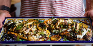 Grilled chermoula chicken with charred lemon,dates and tzatziki. 