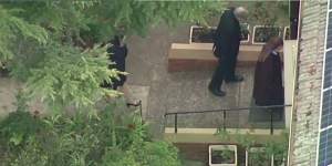 Cardinal Pell entering the Carmelite Monastery in Kew after he was released from Barwon Prison. 