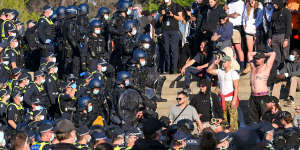 Police move in on protesters at the Shrine of Remembrance in Melbourne.