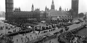 The funeral procession leaves Westminster Hall and passes through Parliament Square on its way to St. Paul's Cathedral.
