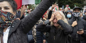 Nasi,last name unavailable,cries during a rally in Washington calling for regime change in Iran following the death of Mahsa Amini,a young woman who died after being arrested in Tehran by Iran’s notorious “morality police”.