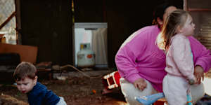 Nova and Atlas Pearce play in their front yard in Broken Hill. The town’s Indigenous children have blood lead levels double those of the general population.