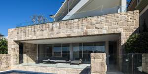 The Corben Architects-designed house,home of Michael and Helen Carapiet,has sold for more than $25 million.