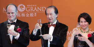 Stanley Ho (centre) celebrates the the opening of MGM Grand Macau in 2007 with his daughter,Pansy,and then MGM CEO Terrence Lanni.