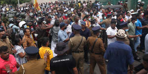 Protesters and pro-government supporters clash in Colombo on May 9,resulting in nine deaths. 